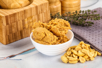 Crunchy peanut butter fat product