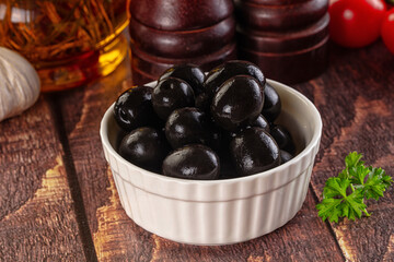 Mediterranean marinated Black olives in the bowl