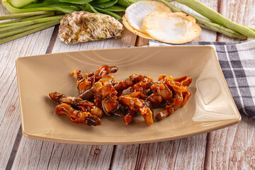 Razor shell mollusk with sauce