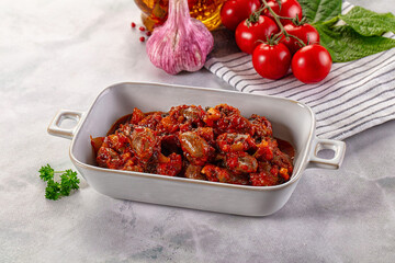 Roasted chicken hearts with vegetables