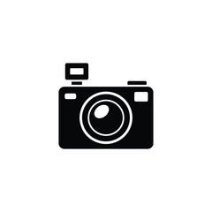 Black silhouette of a vintage camera with a flash