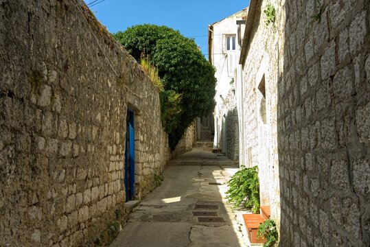 Fototapeta Old town of Rab in Croatia with narrow streets.