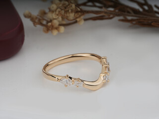 Gold Diamond engagemenet ring for women isolated in white podium 