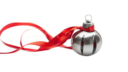 A shiny silver Christmas ornament with a red ribbon, elegantly placed on a white background, ready for holiday decoration, evoking festive spirit and seasonal joy