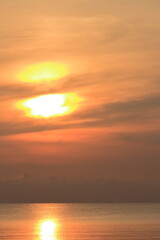 Sunrise over the sea, morning clouds