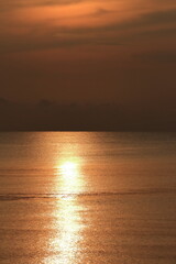 Sunrise over the sea, morning clouds