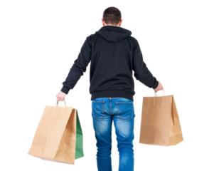 Rear view of a person carrying reusable shopping bags