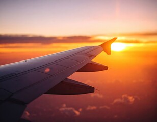 Obraz premium Airplane Wing Sunset View From Above