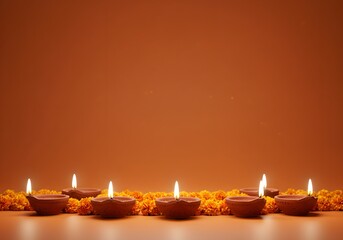 Row of Diya lamps with marigold flowers on orange background