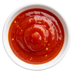 Küchenrückwand glas motiv Scharfe Chili-pfeffer top view of red hot chili pepper sauce on white bowl isolated on white  © ainterior