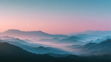Misty mountain range at dawn.