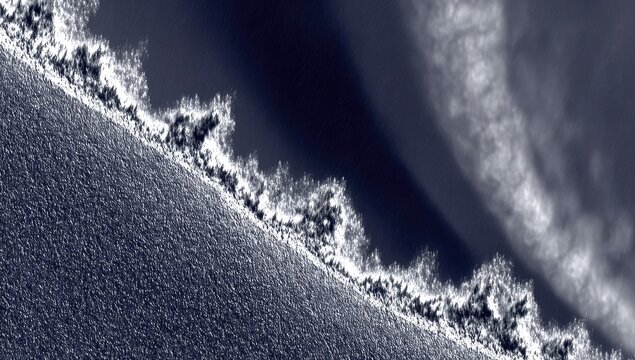 Abstract,  dark  blue-grey  surface  with  white  edged  ridge