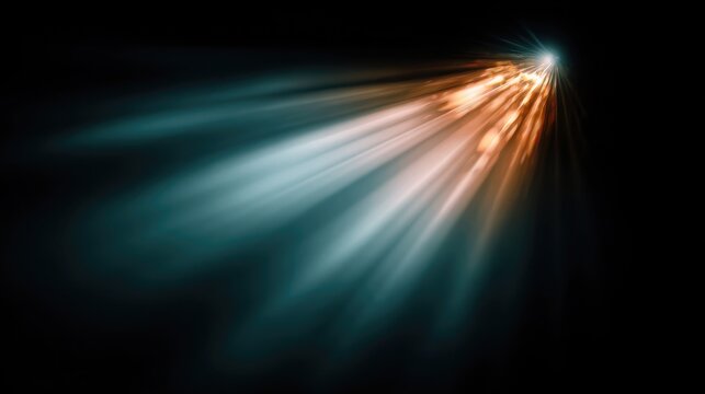 Spotlight flare lens effect captured against a deep black gradient background