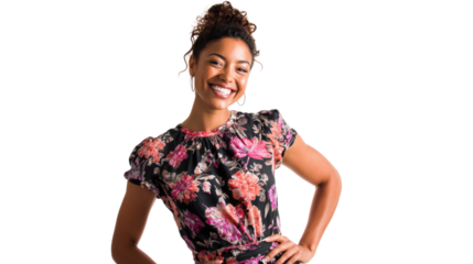 Smiling woman in floral dress posing confidently, white isolated background.