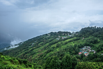 Beautiful landscape with the mountains and clouds of Darjeeling