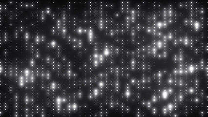 Abstract glowing disco background of white neon flashing lights. Silver LED lights wall for disco party, night club, music, and fashion event. Vibrant disco lights.