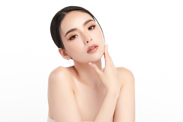A beautiful young Asian woman with clean, fresh skin against a white background. Skincare, facial...