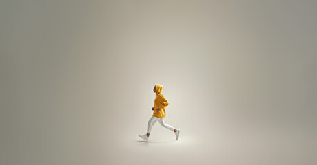 A stylish yellow hoodie and white pants outfit define the woman confident pose, reflecting youthful energy and city inspired fashion.