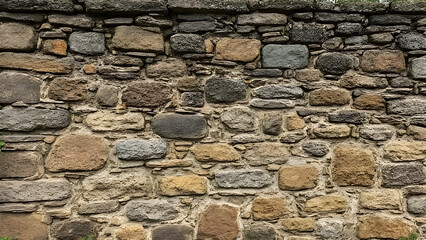 Fototapeta premium Rust stone wall. Stone wall detail, for construction, business, designers, home, interior and exterior decoration applications