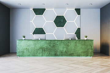 Modern green marble reception desk in stylish office lobby with hexagonal wall design, bright...