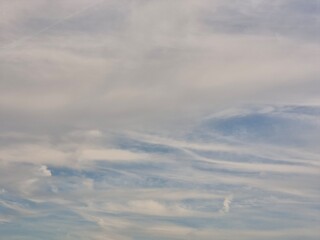 Serene Sky with Soft Clouds