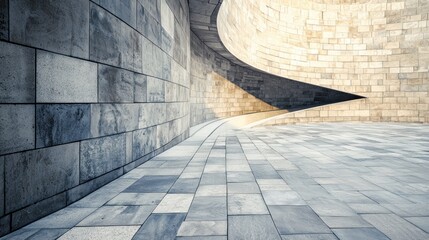 A modern, abstract architectural structure with a curved, geometric design. The space is illuminated by natural light, creating a sense of depth and perspective.