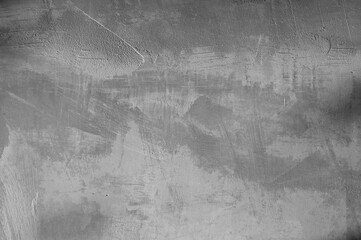 gray background, photo shows texture of plastered concrete wall close-up