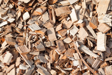 The photo shows a close-up of wood chips
