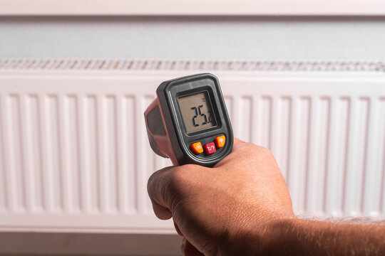Pyrometer for non-contact measurement of heating radiator temperature.