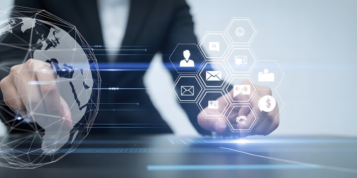 Digital Connectivity: A professional interacts with an abstract, interconnected digital interface representing global communication and data exchange, highlighting modern technology and innovation.