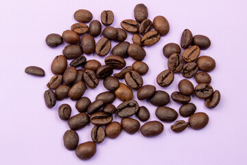Photo of Big pile of fresh roasted coffee beans close up. Food photo