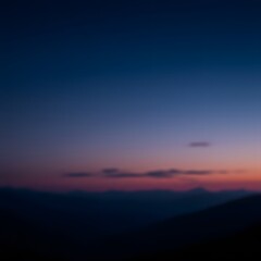 Obraz premium Ethereal and atmospheric blur of a vibrant sunset gradient over a mountain range, a dreamy and abstract landscape