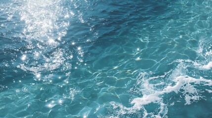 Glistening blue water surface with gentle waves reflecting sunlight, capturing the essence of a tranquil sea.