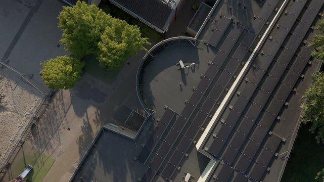 Alkmaar, Netherlands - August 8, 2025: Aerial View of IKC &rsquo;t Baeken and Kindercentrum Rollebol with Solar Panels on Rooftop