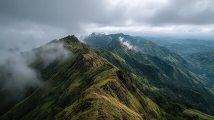 Scenic Mountain Ridge Under Cloudy Sky with Dramatic Landscape Views