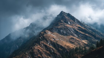 Dramatic Mountain Ridge Under Cloudy Sky with Scenic Views