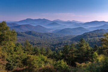 Obraz premium Serene mountain vista with verdant forests under a softly hued morning sky