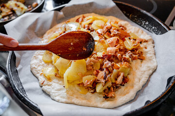 Cooking a pie with potatoes and meat. Home cooking