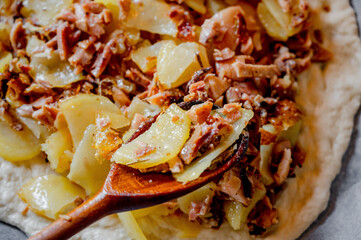 Cooking a pie with potatoes and meat. Home cooking