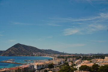 Panoramic view of the coast of Altea, Alicante, Spain, showing the marina, bay, and mountain...