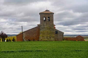 Fototapeta premium Church of San Andres in Villarrobejo with brick bell tower, Palencia