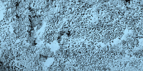 Abstract mosaic textured background in shades of blue and black featuring a detailed gritty pattern