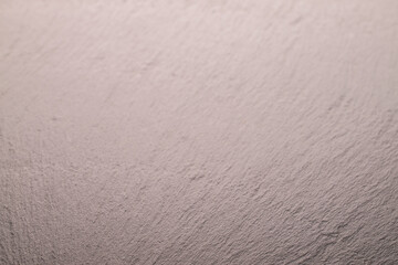 Surface of dark slate stone, macro.