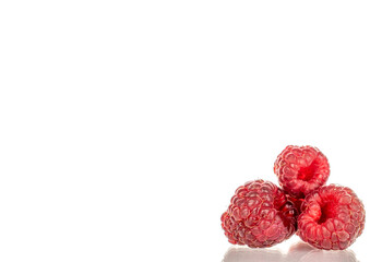 Sweet ripe raspberries isolated on white background, macro.