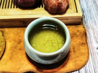 Chinese tea ceremony. Cup of green tea.