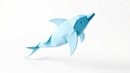 A light blue origami dolphin sculpture on a white surface