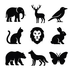 Obraz premium A collection of black silhouettes of various animals, including a deer, lion, rabbit, and bear.