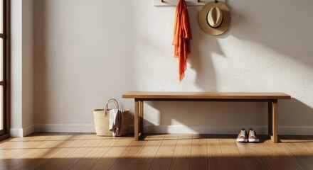 Wooden bench with orange scarf and straw hat on wall and basket with shoes on floor entryway hallway