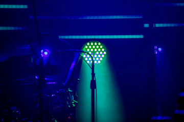 LED stage lights illuminating an empty performance space - just before the musicians arrive onstage.