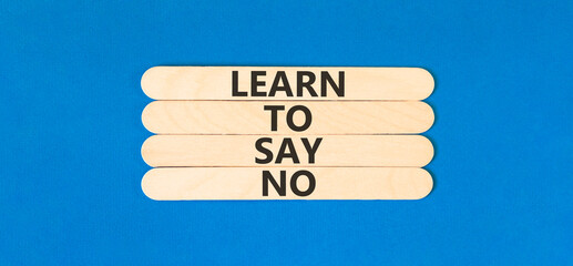 Learn to say no symbol. Concept words phrase Learn to say no on beautiful wooden stick. Beautiful...